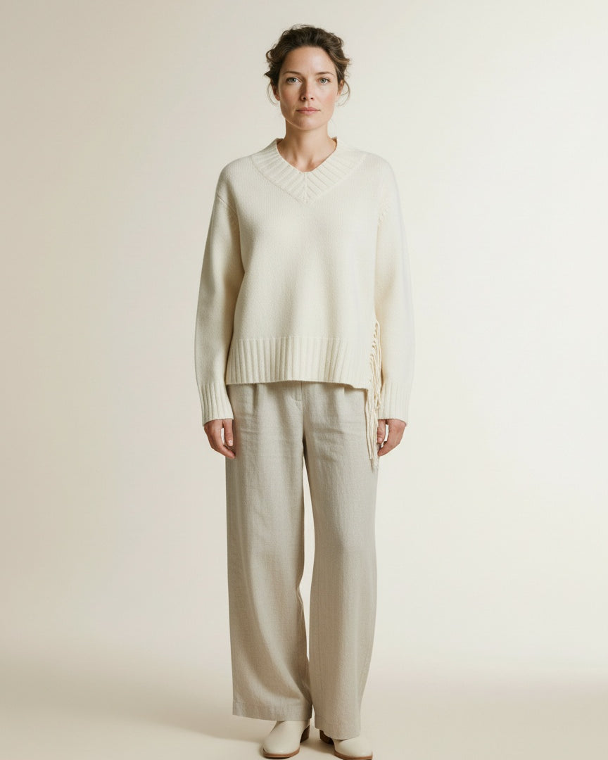 Full body view of the model wearing Mos Mosh Mmeshala Fringe V-neck Knit 180 Ecru