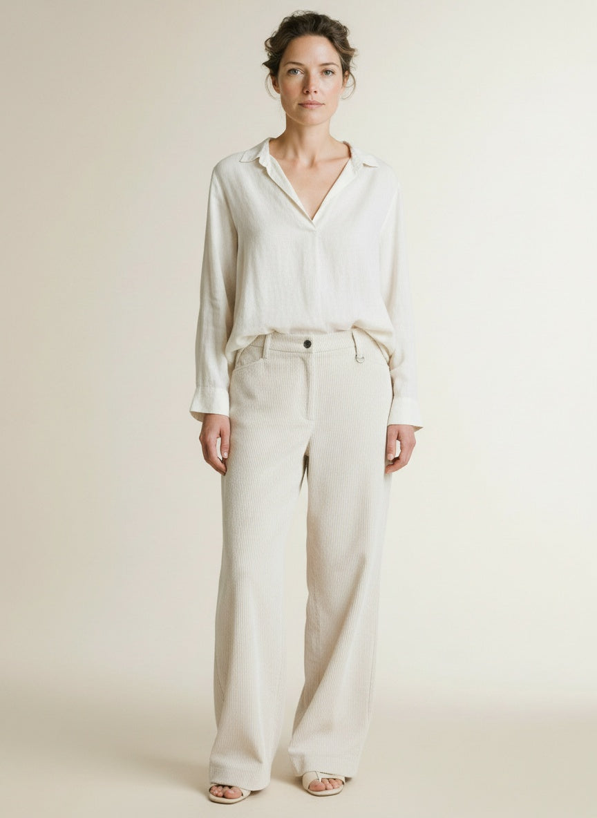 Full body view of the model wearing Mac Palazzo Jeans White Sand