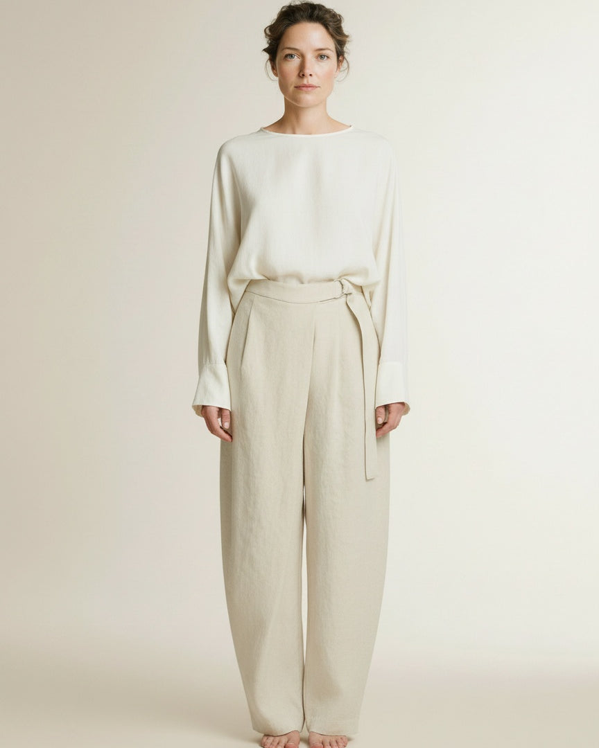 Full body view of the model wearing Msch Copenhagen Mschzein Esteriane Hw Pants Bleached Sand