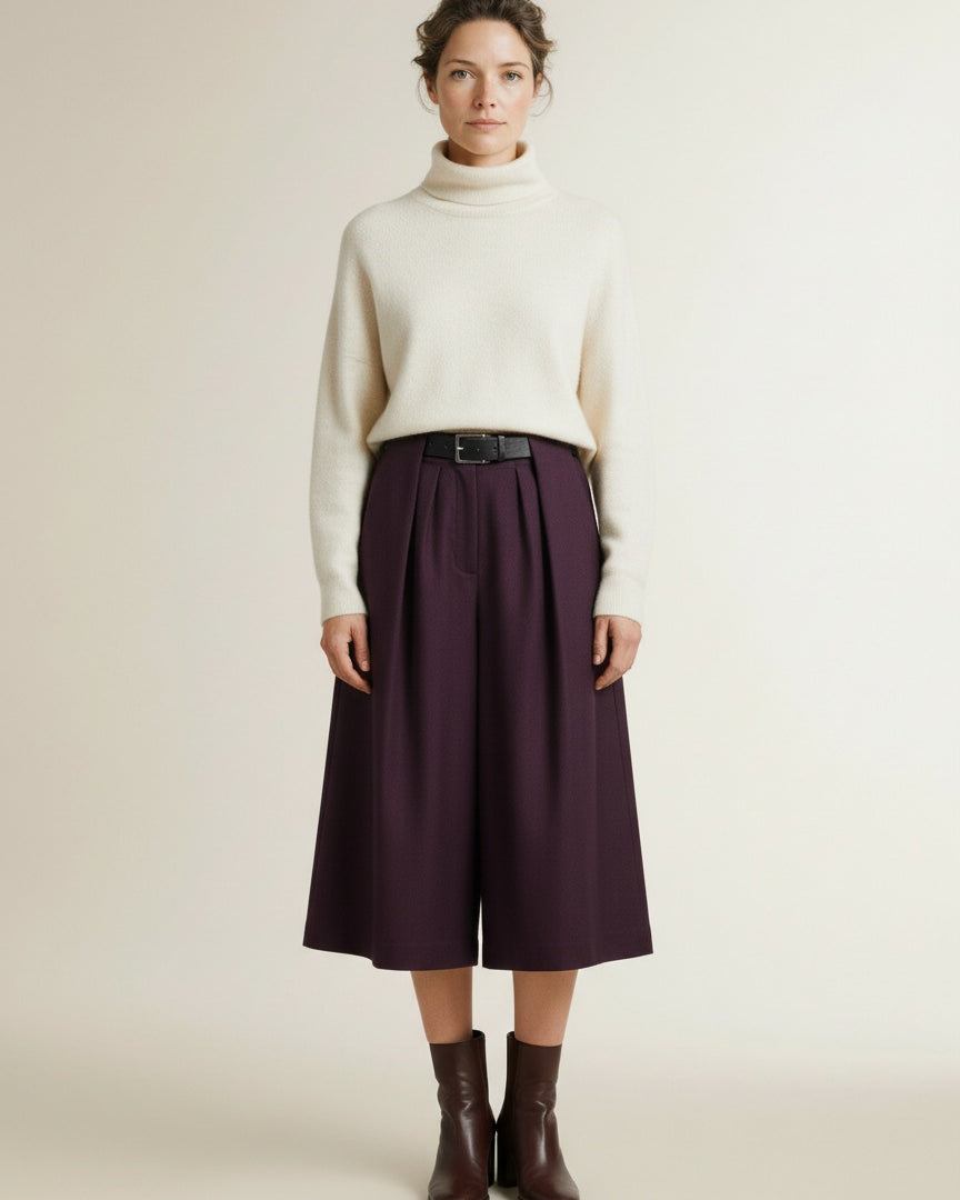 Full body view of the model wearing Copenhagen Muse Cmtailor Pants Bermuda Plum Perfect Melange