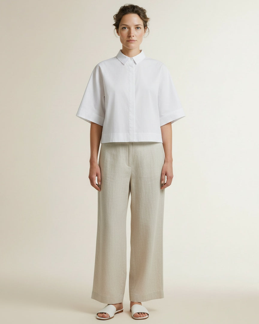 Full body view of the model wearing Co'couture Elaracc Ss Shirt White