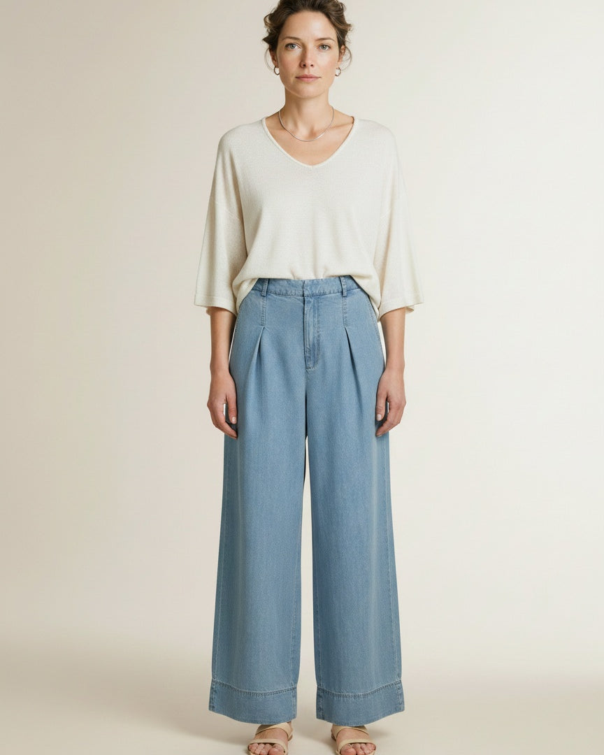 Full body view of the model wearing Co'couture Tillycc Pleat Ll Pant Fade Denim