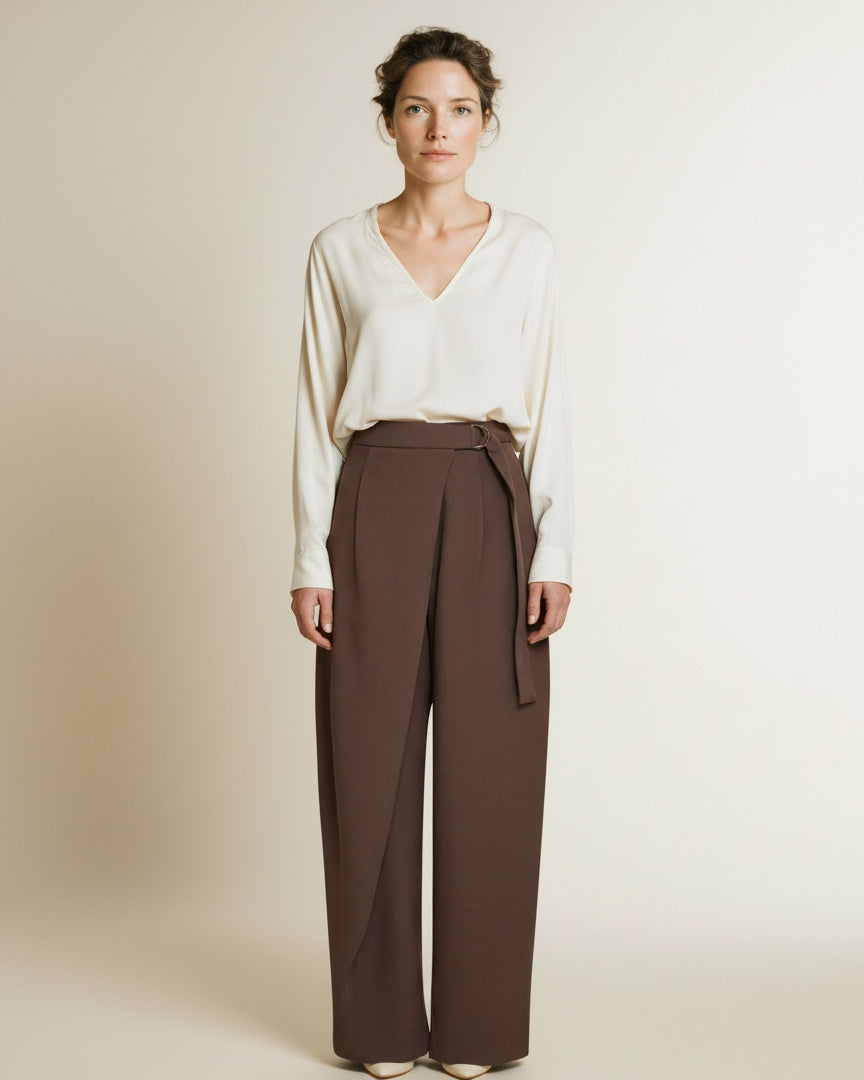 Full body view of the model wearing Msch Copenhagen Mschzein Esteriane Hw Pants Hot Fudge