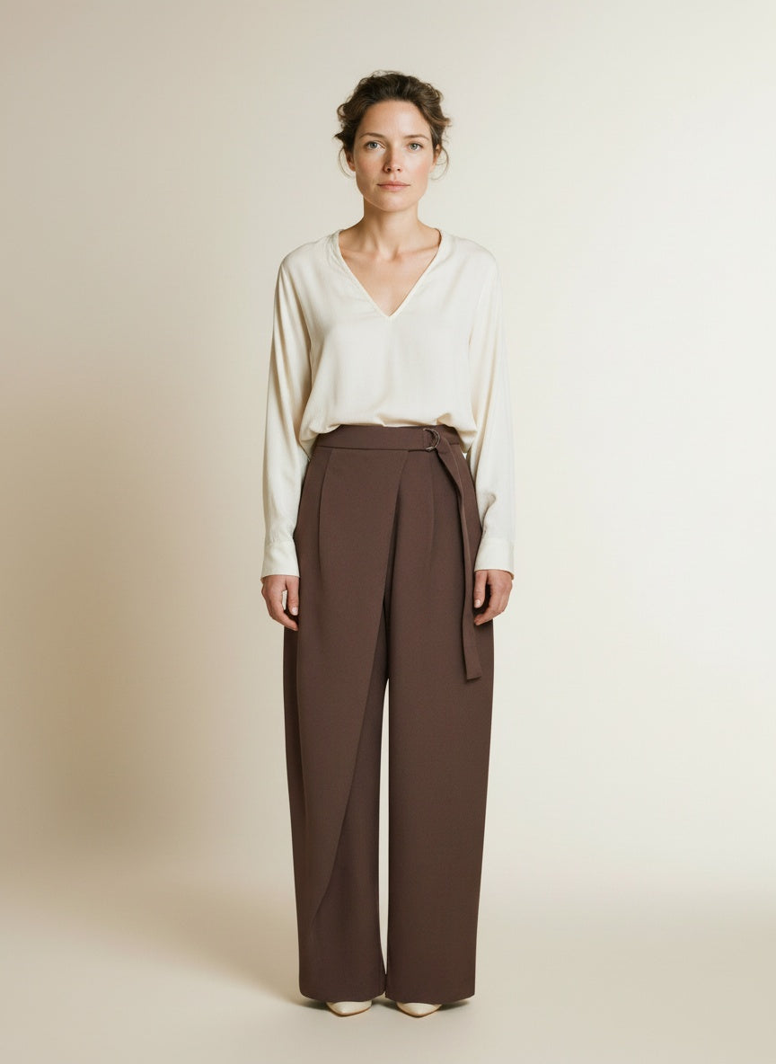 Full body view of the model wearing Msch Copenhagen Mschzein Esteriane Hw Pants Hot Fudge