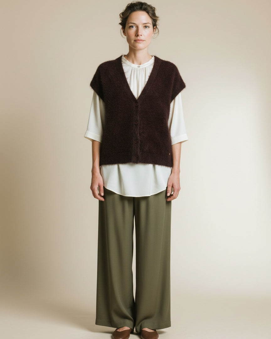 Full body view of the model wearing Red Button Sleeveless Fuzzy Burgundy