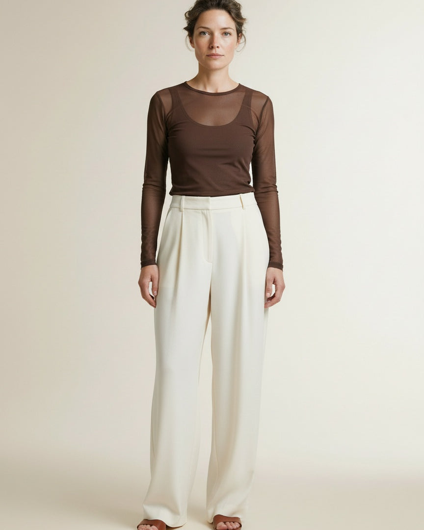 Full body view of the model wearing Co'couture 33201 Meshcc O-neck Blouse Brown