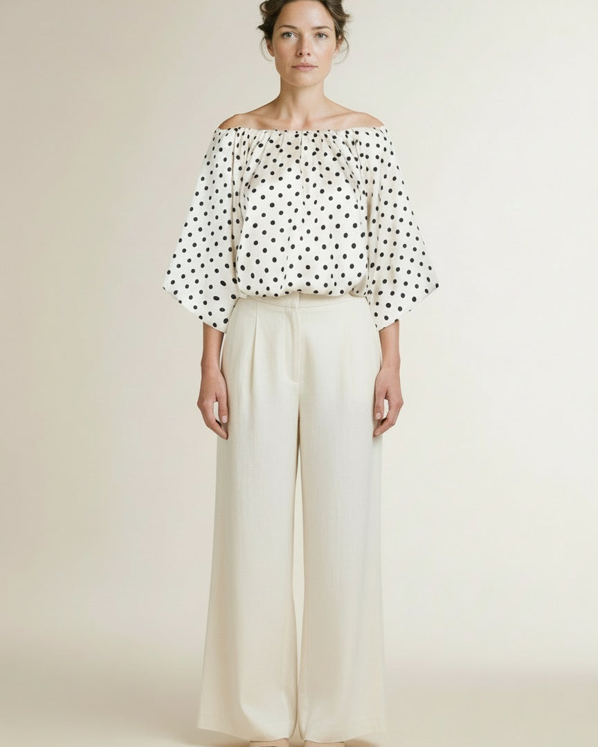 Full body view of the model wearing Aaiko Maddy Dot Pes 511 Top Lesblancs