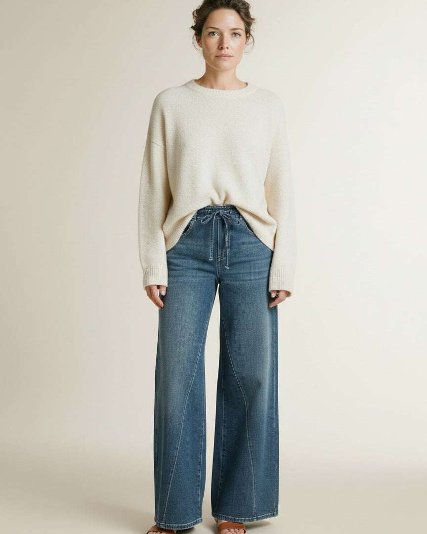 Full body view of the model wearing Mac Wide Jeans Greenish Blue