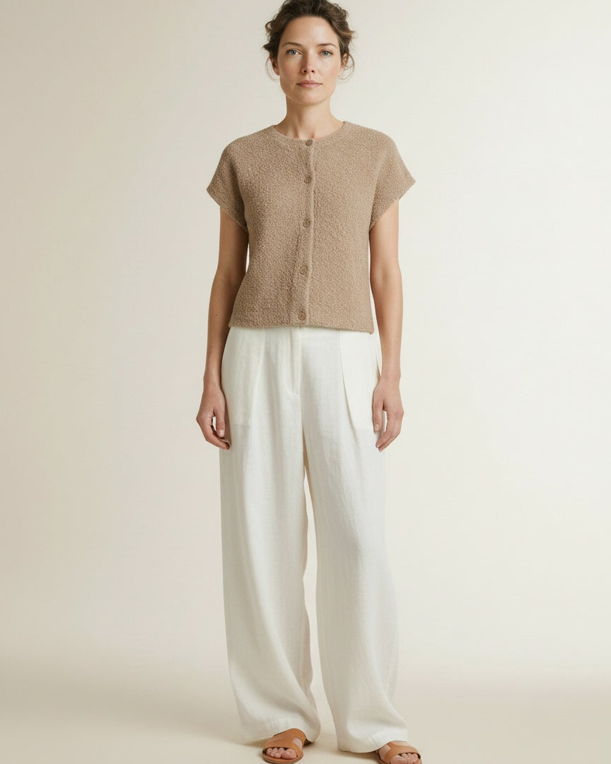 Full body view of the model wearing Red Button Sleeveless Knit Boucle Latte