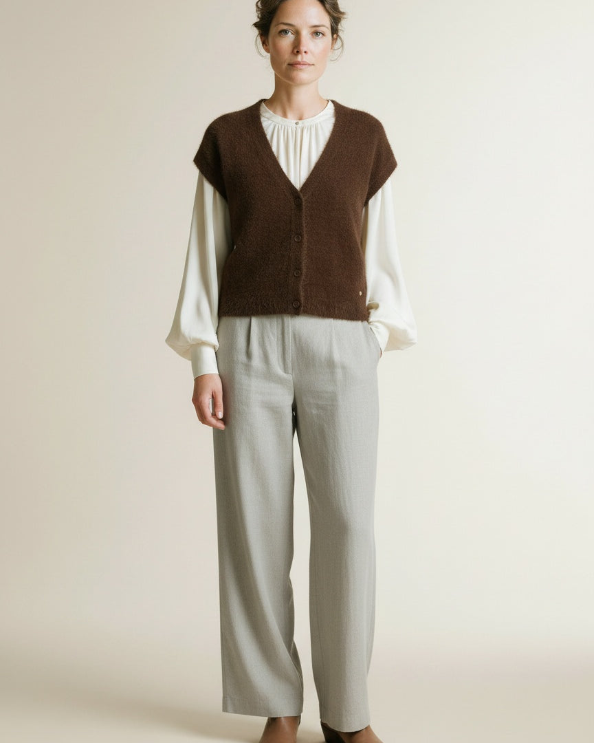 Full body view of the model wearing Red Button Sleeveless Fuzzy Praline