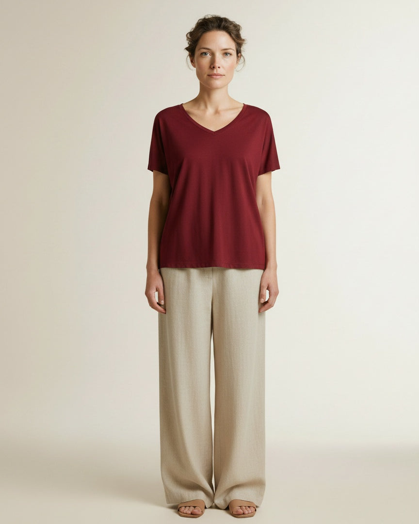 Full body view of the model wearing Msch Copenhagen Mschfenya Modal V Neck Tee Rhubarb