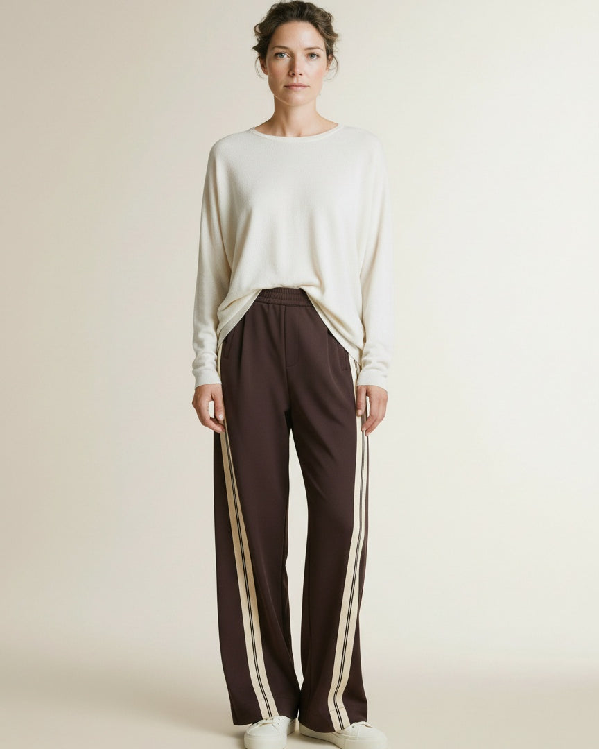 Full body view of the model wearing Co'couture Alinicc Double Panel Pant Dark Brown L34