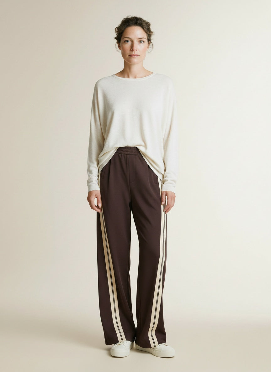 Full body view of the model wearing Co'couture Alinicc Double Panel Pant Dark Brown L34