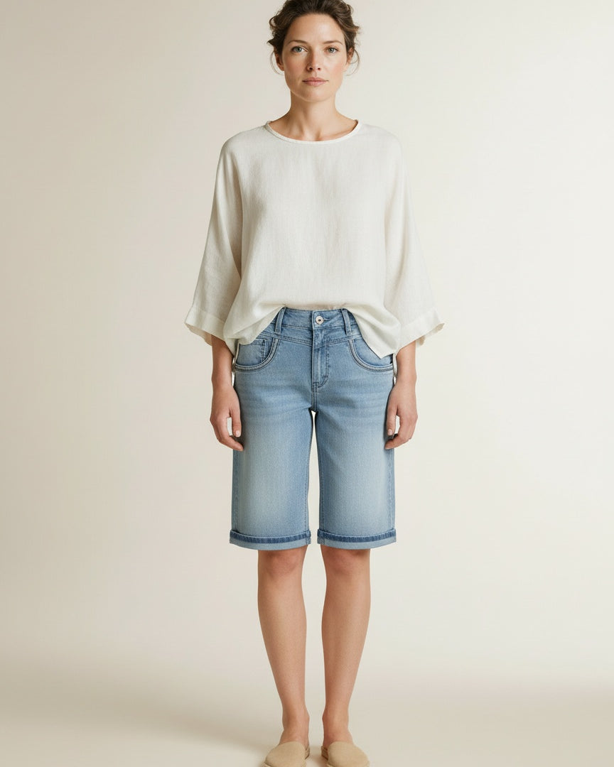 Full body view of the model wearing Red Button Sienna Short Embroidery Bleach