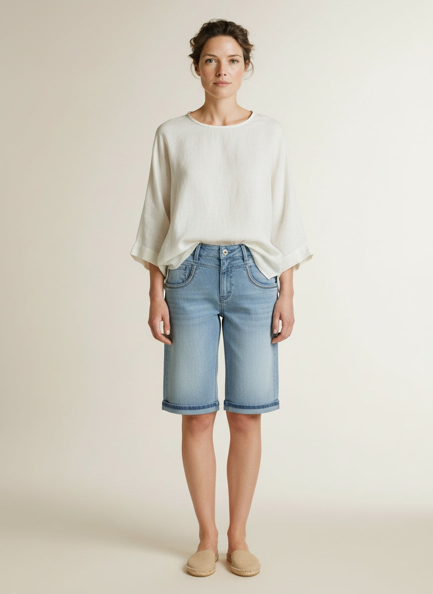 Full body view of the model wearing Red Button Sienna Short Embroidery Bleach