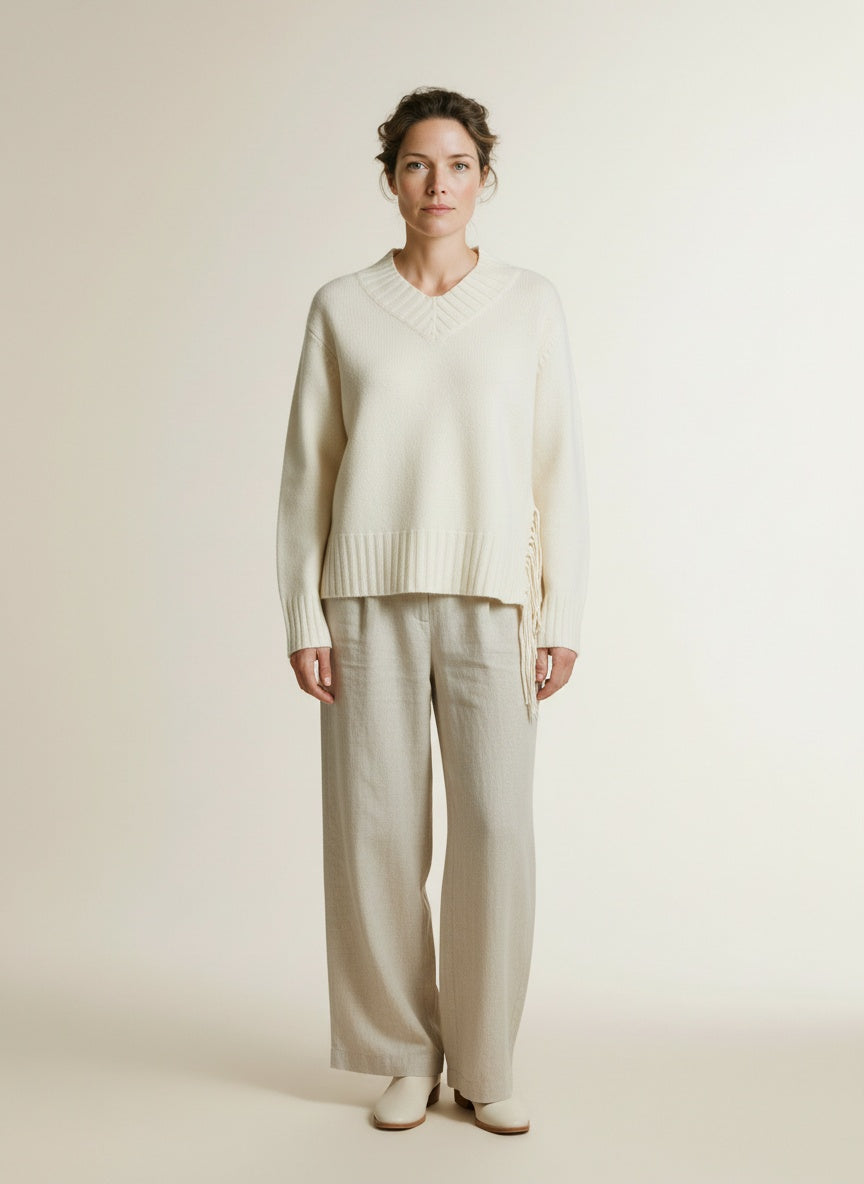 Full body view of the model wearing Mos Mosh Mmeshala Fringe V-neck Knit 180 Ecru
