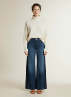 Full body view of the model wearing Mac Wide Jeans Dark Sky Blue