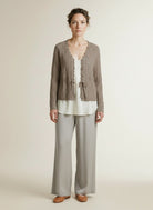 Full body view of the model wearing Red Button Cardigan Ajour Sparkle Truffle