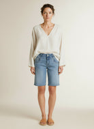 Full body view of the model wearing Red Button Sienna Short Embroidery Light Stone