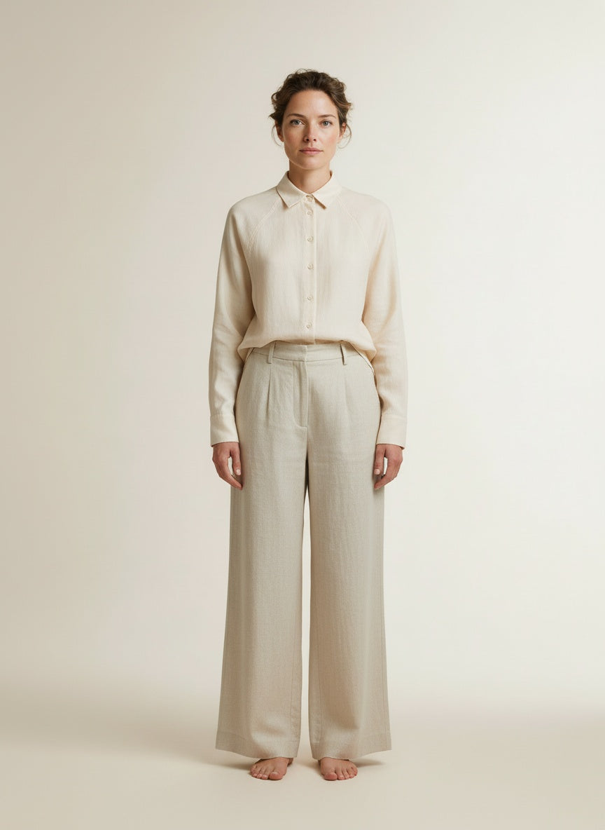 Full body view of the model wearing Yaya Blouse With Angled Seams And Button Details Creme Beige