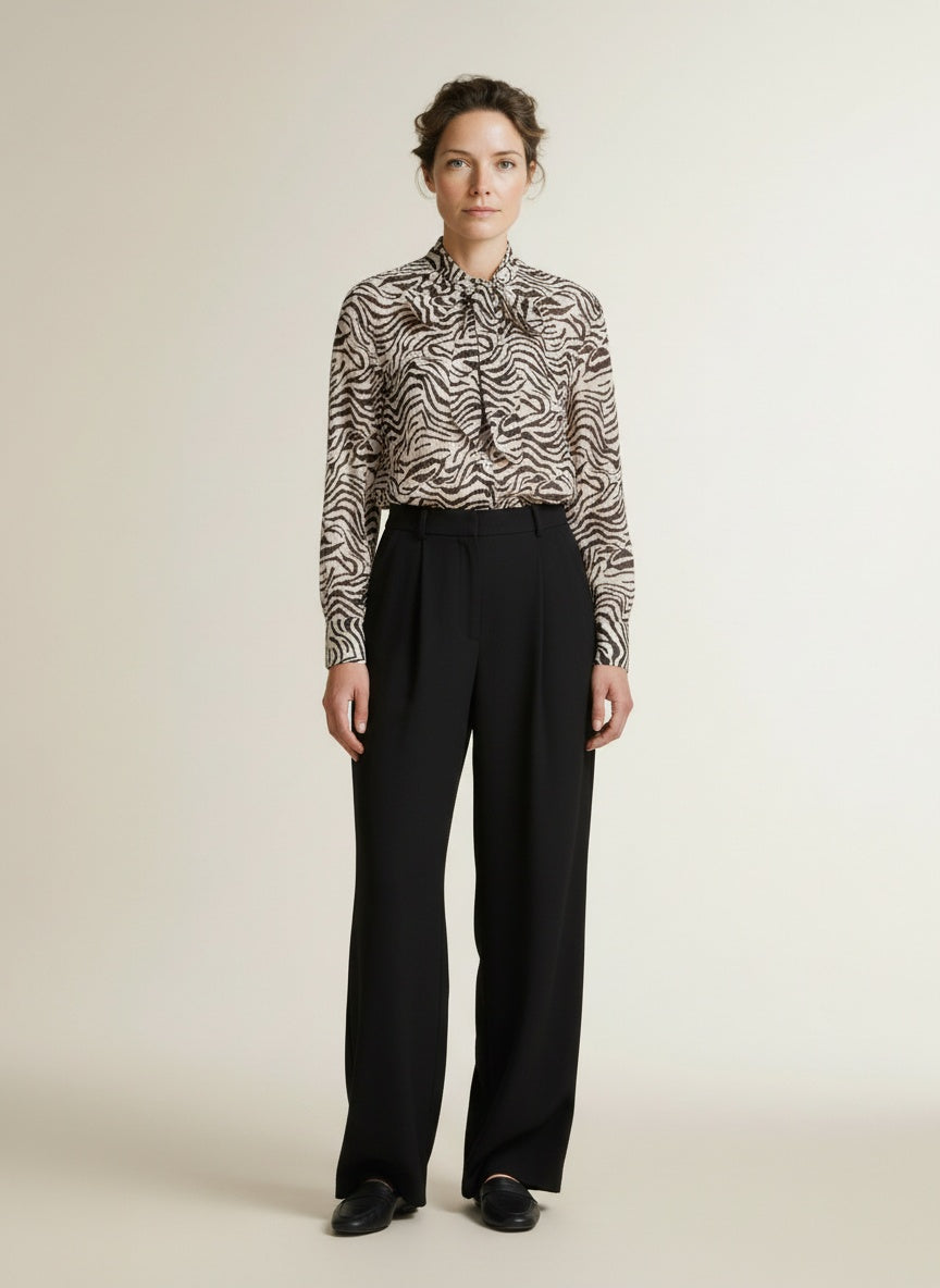 Full body view of the model wearing Red Button Blouse Zebra Espresso