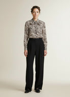 Full body view of the model wearing Red Button Blouse Zebra Espresso