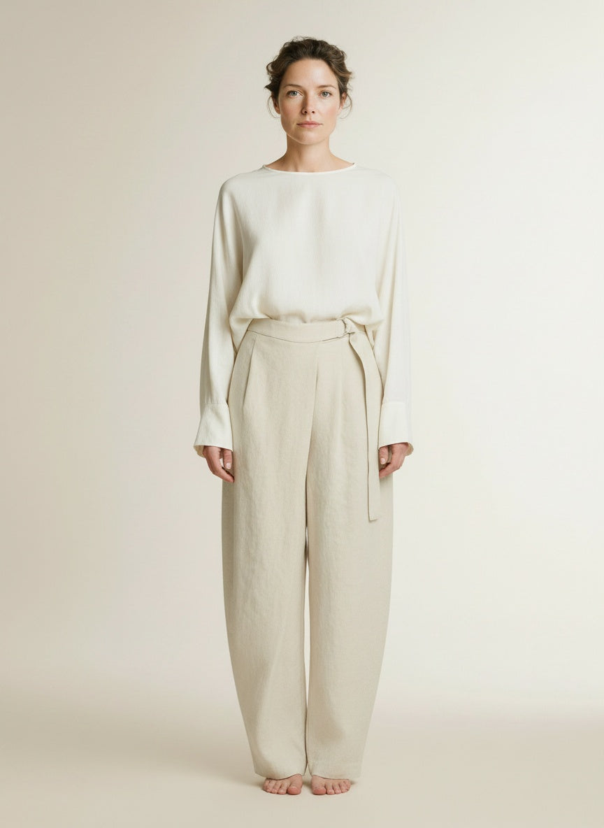 Full body view of the model wearing Msch Copenhagen Mschzein Esteriane Hw Pants Bleached Sand