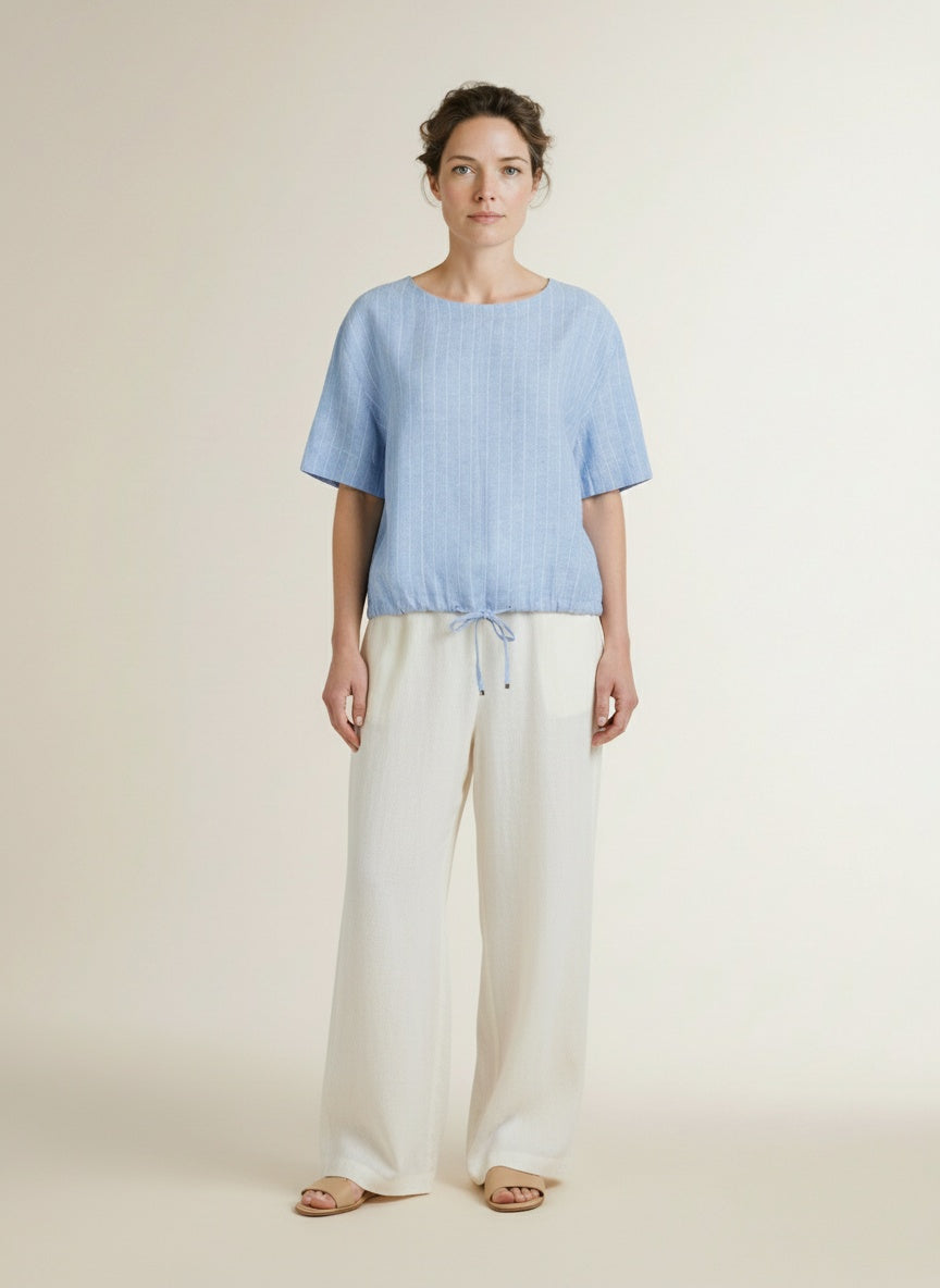 Full body view of the model wearing Red Button Skyler Linen/visc Pinstripe Light Blue