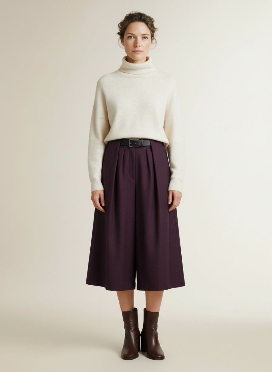 Full body view of the model wearing Copenhagen Muse Cmtailor Pants Bermuda Plum Perfect Melange