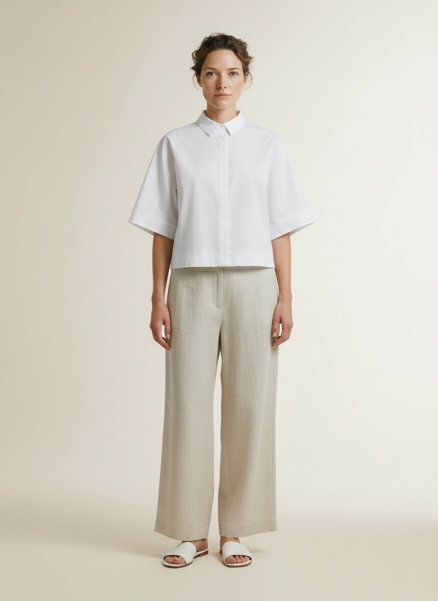 Full body view of the model wearing Co'couture Elaracc Ss Shirt White