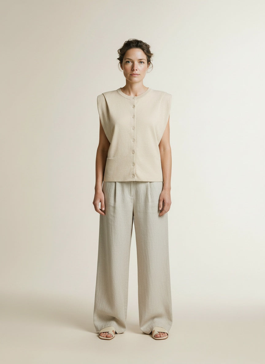 Full body view of the model wearing Yaya Sleeveless Cardigan Shoulder Detail Cloud Creme White