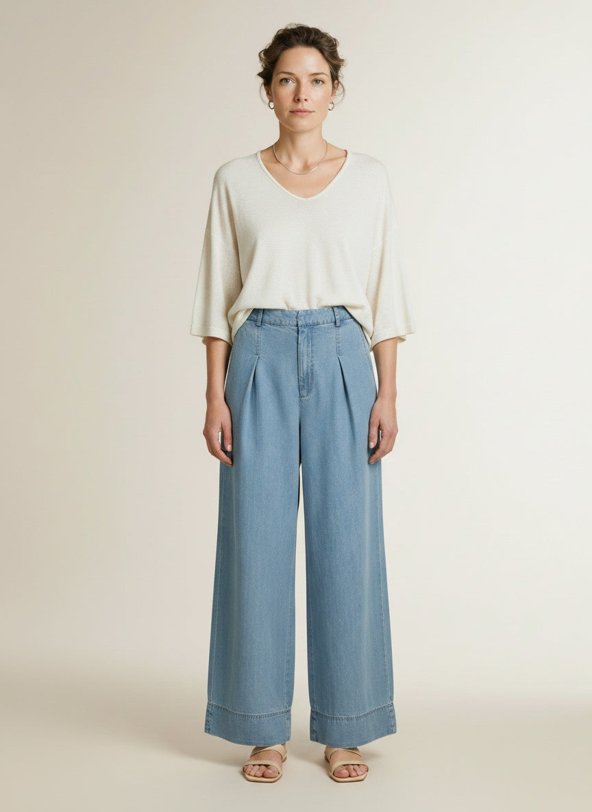 Full body view of the model wearing Co'couture Tillycc Pleat Ll Pant Fade Denim