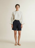 Full body view of the model wearing Red Button Cleo Short Palazzo Pinstripe Darkblue