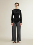 Full body view of the model wearing Studio Anneloes Marlena Top 9000 Black