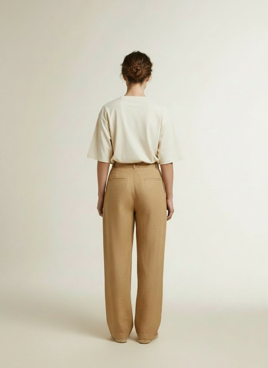 Back pose of the model wearing Co'couture Zengacc Tee O-neck Suntan