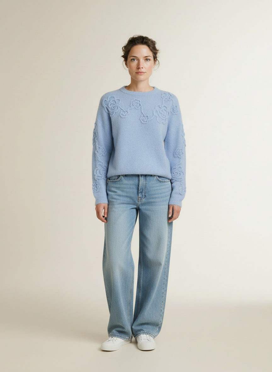 Full body view of the model wearing Msch Copenhagen Mschmiabelle Hope Pullover Emb Windsurfer Flwr