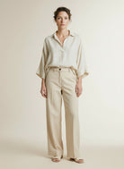 Full body view of the model wearing Co'couture Terrycc Denim Ll Pant Bisquit