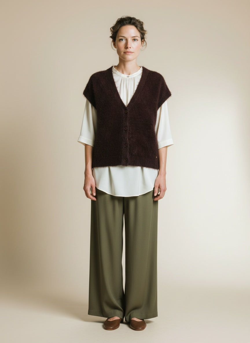 Full body view of the model wearing Red Button Sleeveless Fuzzy Burgundy
