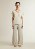 Full body view of the model wearing Yaya Short-sleeved Sweater With Double V-neck Creme Beige