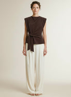 Full body view of the model wearing Co'couture Esticc Pleat Top Bison