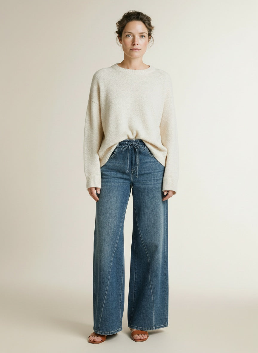 Full body view of the model wearing Mac Wide Jeans Greenish Blue