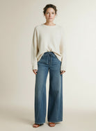 Full body view of the model wearing Mac Wide Jeans Greenish Blue