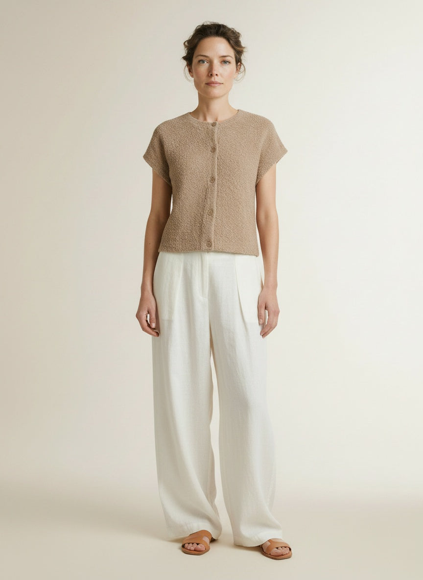 Full body view of the model wearing Red Button Sleeveless Knit Boucle Latte