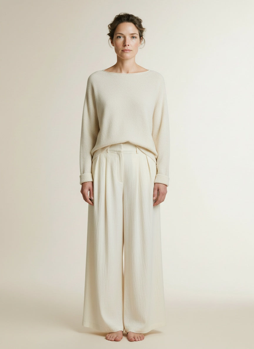 Full body view of the model wearing Co'couture Auracc Skirt Ll Pant Off White