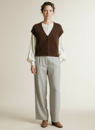 Full body view of the model wearing Red Button Sleeveless Fuzzy Praline