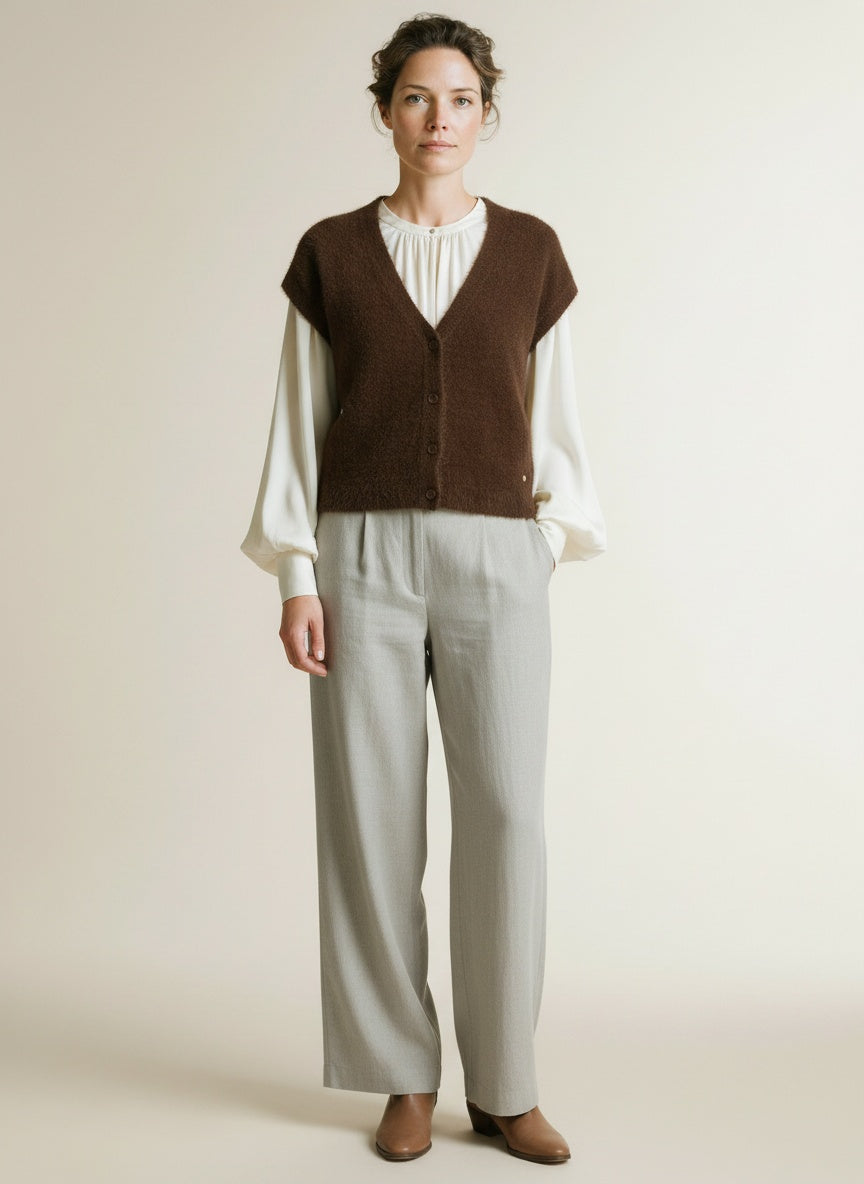 Full body view of the model wearing Red Button Sleeveless Fuzzy Praline