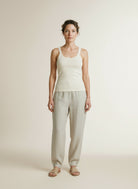 Full body view of the model wearing Yaya Singlet With Mesh Detail Creme Beige