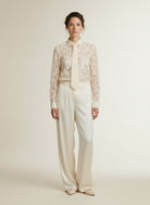 Full body view of the model wearing Mos Mosh Mmkether Lace Tie Shirt 180 Ecru