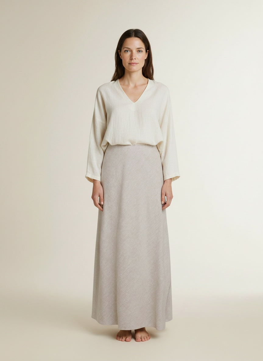 Full body view of the model wearing Msch Copenhagen Mschviana Ginia Skirt Sand Melange