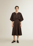 Full body view of the model wearing Copenhagen Muse Cmvianna-dress Mulch